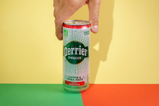 Tyumen, Russia-June 30, 2022: Mineral water Perrier energize caffeine yerba mate. French brand of premium mineral water
