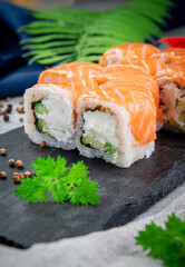 Sushi rolls filadelfia with cucumber. Traditional Japanese cuisine