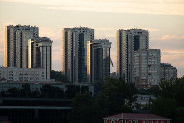 Cityscape on the banks of the Dnieper River, skyscrapers on the banks of the river in Ukraine 2022