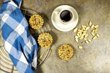 delicious homemade almond pies or tartlets and cup of coffee