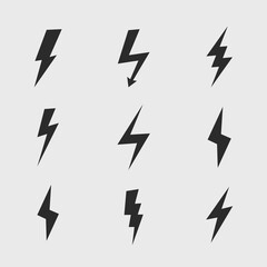 Set of 9 Lightning flat icons. Black thunderbolts icons isolated on grey background. Vector illustration