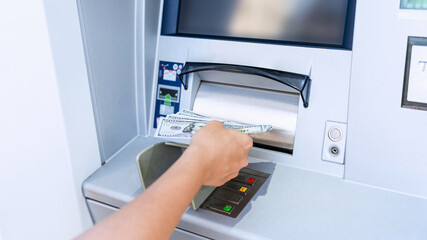 Atm card machine cash. Holding american bill cash. Woman withdraw money usd hundred dollar. Bank credit card money background.