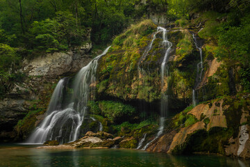 Fototapeta premium Beautiful color summer waterfall Virje in Slovenia Alps
