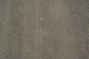 Rough pebbled texture of pavement