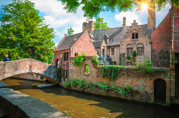 Naklejka premium Beautiful canal and traditional houses in the old town of Bruges (Brugge), Belgium
