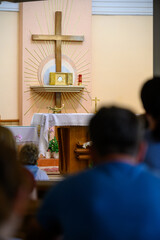 The Blessed Sacrament exposed for adoration in the adoration chapel  and people are praying in prostration. Medjugorje, Bosnia and Herzegovina. 2021-08-03.  - obrazy, fototapety, plakaty