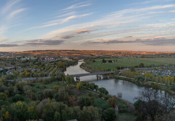 Fototapeta na wymiar Nice sunset from one of the viewpoints of Toledo capital witnessing the Tajo river crossing the lands of Castilla la Mancha, Spain.