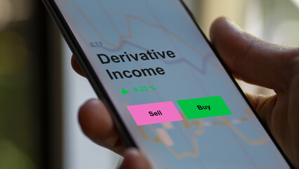 An investor's analyzing the derivative income etf fund on a screen. A phone shows the prices of Derivative Income leverages instruments futures forward contracts, swaps, and options to bet