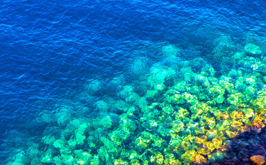 Background made of crystal clear azure and blue sea water. Mediterranean sea. View from above