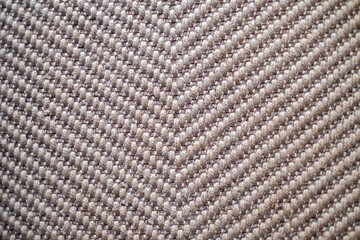 Background close up of natural brown color rug flatwoven, Made of natural materials, made of jute, smooth Indian style rugs,