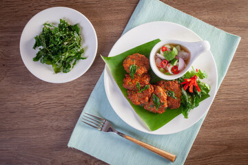 Thai Fish Cake Paste chili deep fried with herb and Crispy Thai Basil.