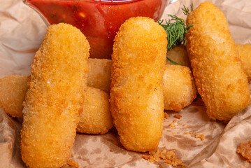 Deep fried crispy cheese sticks. Fried mozzarella cheese.