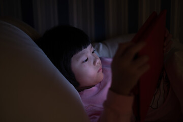 chinese child addicted phone, asian girl playing smartphone, kid watching cartoon
