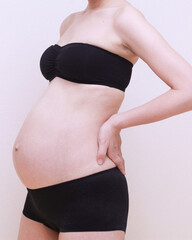 妊娠中の女性の身体のポートレート