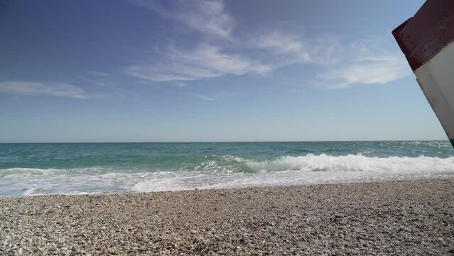 Boat on Playa de Burriana beach, Nerja, Costa del Sol, Malaga Province
