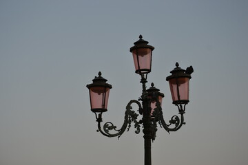 Fototapeta na wymiar Street lamps lights in Venice, Italy