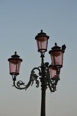 Fototapeta na wymiar Street lamps lights in Venice, Italy