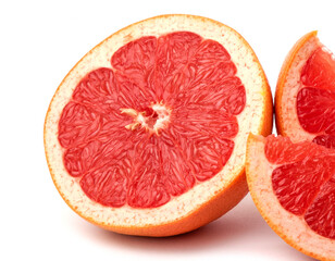 Naklejka na ściany i meble whole and cut fresh grapefruit and slices isolated on white background, Blood oranges whole and sliced on white surface. Ripe half of pink grapefruit citrus fruit, front view copy space isolated macro