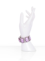 Phosphosiderite sterling silver bracelet adjustable chain on plastic mannequin female hand. Collection of natural gemstones accessories. Studio shot