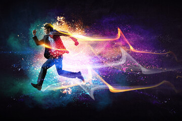 Portrait of energetic businessman running