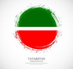 Creative circular grungy shape brush stroke flag of Tatarstan on a solid background