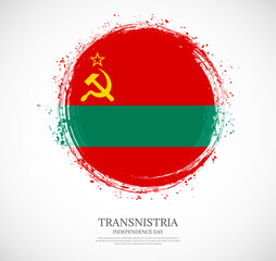 Creative circular grungy shape brush stroke flag of Transnistria on a solid background