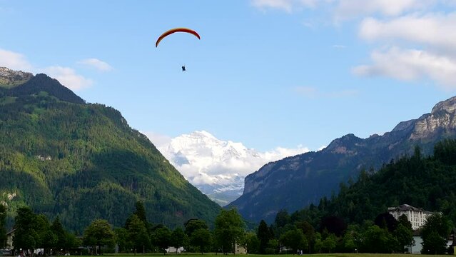 paragliding in the mountains of Switzerland with the Jungfrau in the background
