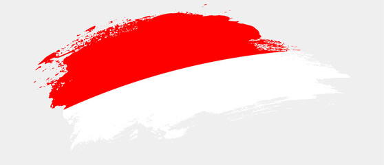 National flag of Indonesia with curve stain brush stroke effect on white background