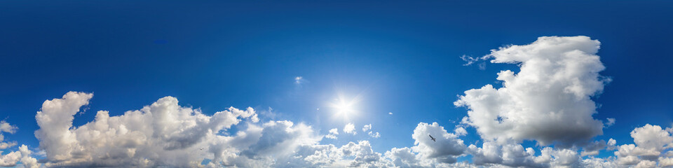 Blue sky panorama with puffy Cumulus clouds. Seamless hdr pano in spherical equirectangular format. Sky dome or zenith for 3D visualization, game and sky replacement for aerial drone 360 panoramas.