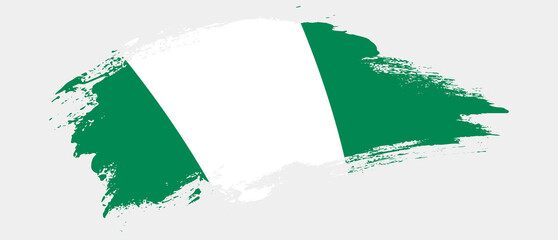 National flag of Nigeria with curve stain brush stroke effect on white background