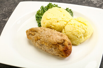 Crispy chicken cutlet with mashed potato