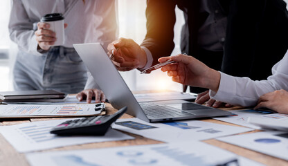 Business Team working at office with documents on his desk, doing planning analyzing the financial...