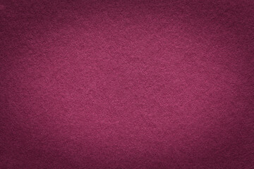 Texture of vintage wine paper gradient background with dark vignette. Structure of craft purple...