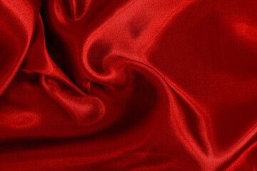 Red fabric cloth texture for background and design art work, beautiful crumpled pattern of silk or linen.