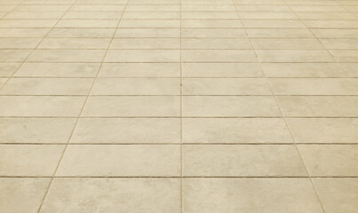 Perspective brick tile floor background. Natural stone street road texture.