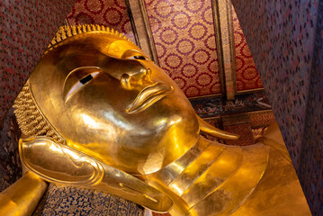 Golden reclining Buddha Statue at  Wat Phra Chetuphon , Wat Pho temple, Bangkok, Thailand.
