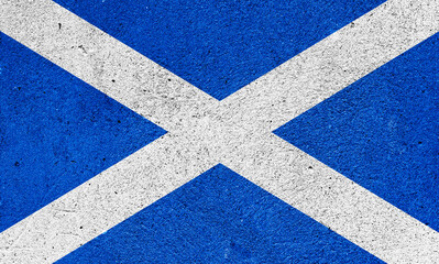 Fototapeta na wymiar State flag of Scotland on a plaster wall