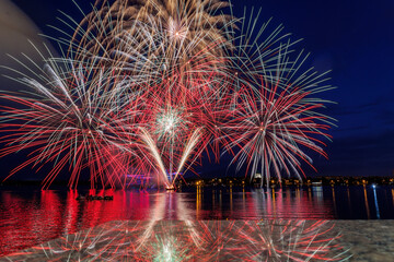 Festive fireworks on the city pond on the Day of the metallurgist in Nizhny Tagil.