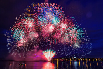 Festive fireworks on the city pond on the Day of the metallurgist in Nizhny Tagil.