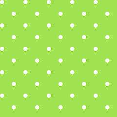 Abstract simple fabric seamless pattern with white polka dot on a green background