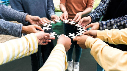 Team Hands Empathy Trust Partner partnership grow and placing the jigsaw puzzle for connect...