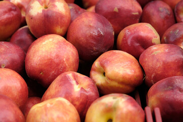juicy peaches on the store shelf