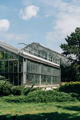 Fototapeta na wymiar Exterior of greenhouses with botanical gardens in Poland, Poznan