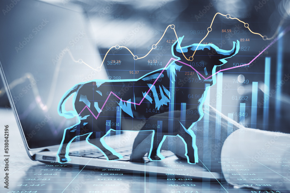 Aufkleber Concept of bullish market. Close up of businessman hands using notebook keyboard with glowing bull hologram over forex chart on blurry background. Trade and invest concept. Double exposure.