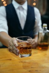 Barman pouring whiskey whiskey glass beautiful night