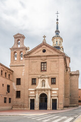 Fototapeta na wymiar View at the Church of Santa Maria Magdalena in the streets of Alcala de Henares - Spain