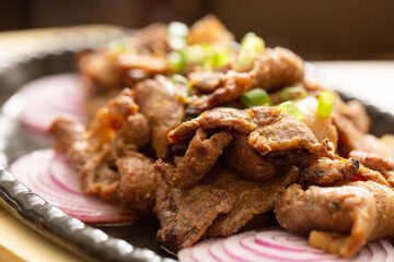 bulgogi, sliced and seasoned, barbequed beef