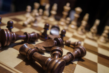 Chess pieces lying on board