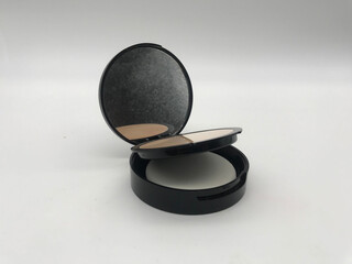 Makeup powder in a box and a mirror and puff,Include Clipping Path.