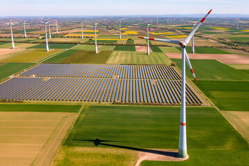 Solar panels of a solar park with wind turbines for the production of renewable energies for the...